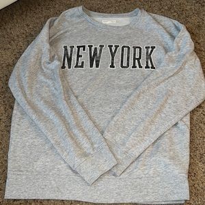 grey sweatshirt